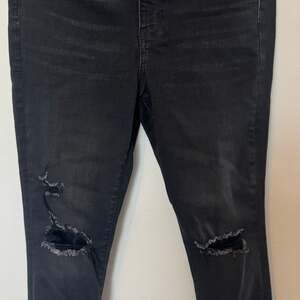 American Eagle Super Hi-Rise Next Level Stretch Distressed Black Jeggings